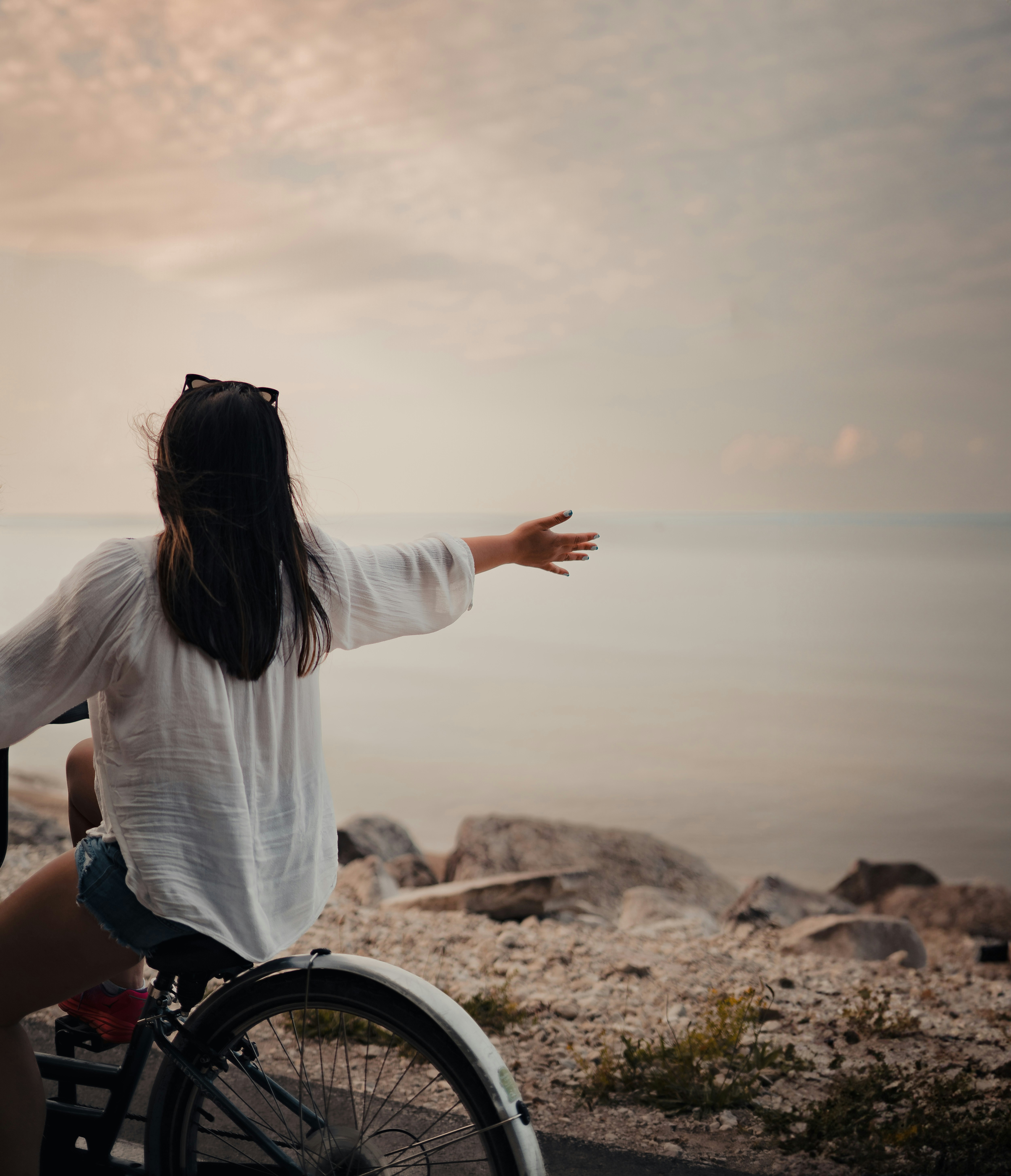 A wheelchair user taking in a coastal view