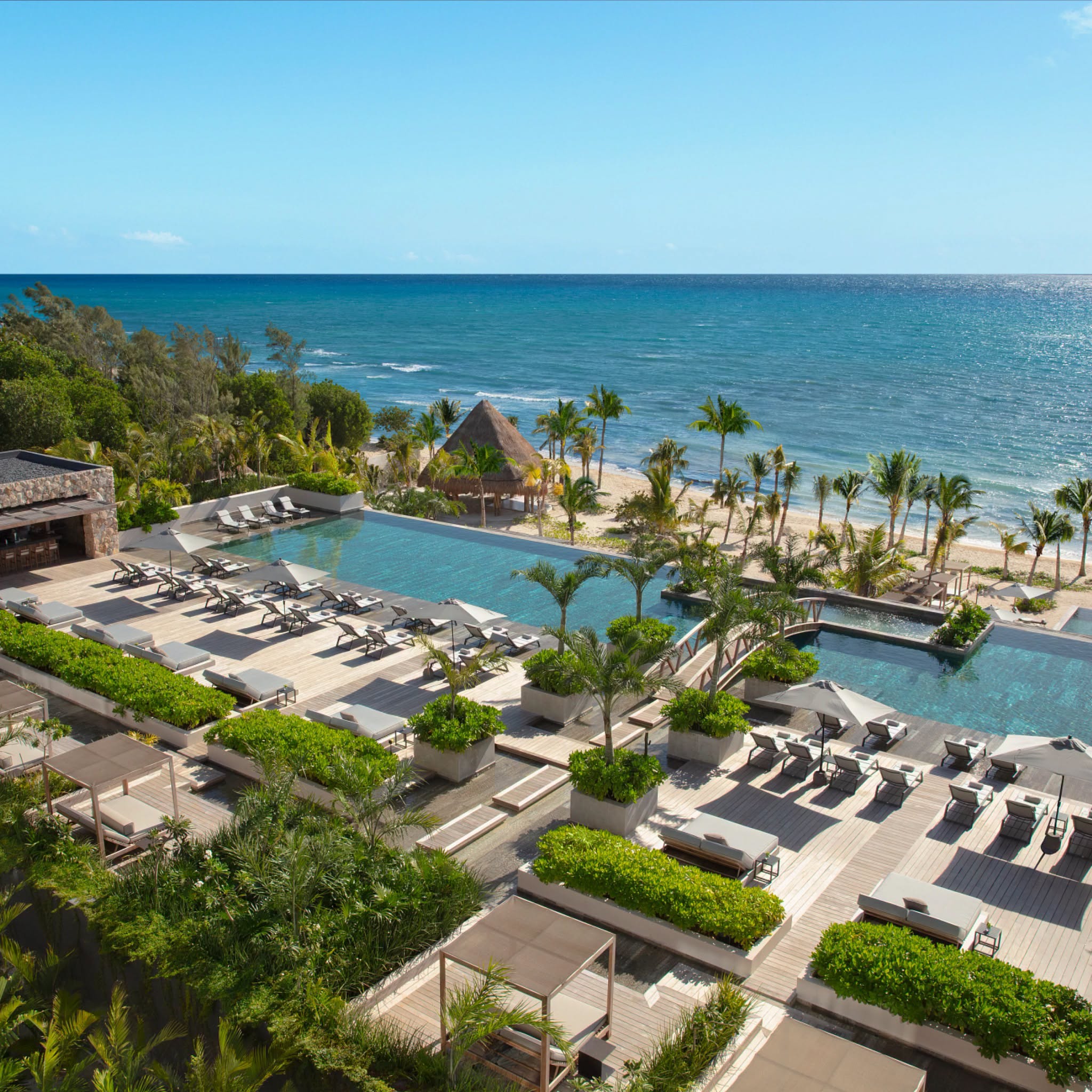 Luxury pool and beachfront at Impression Moxché by Secrets