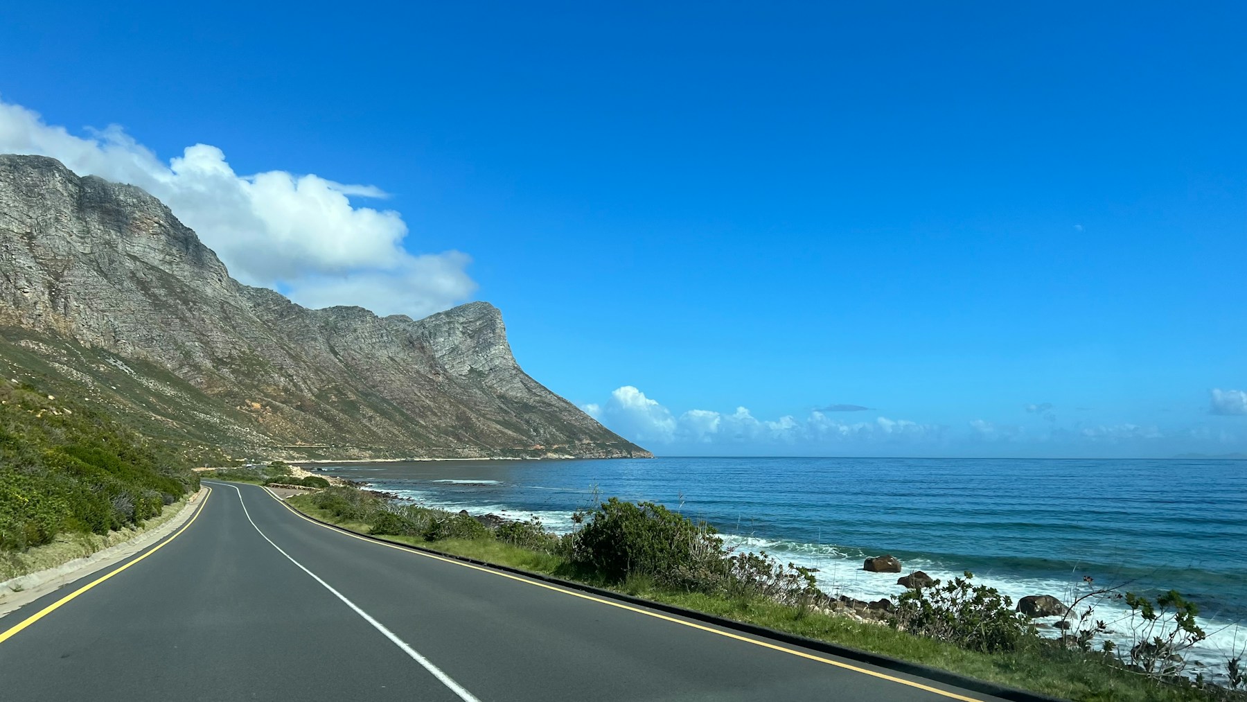Coastal road beside the sea in South Africa · Self-drive destination context