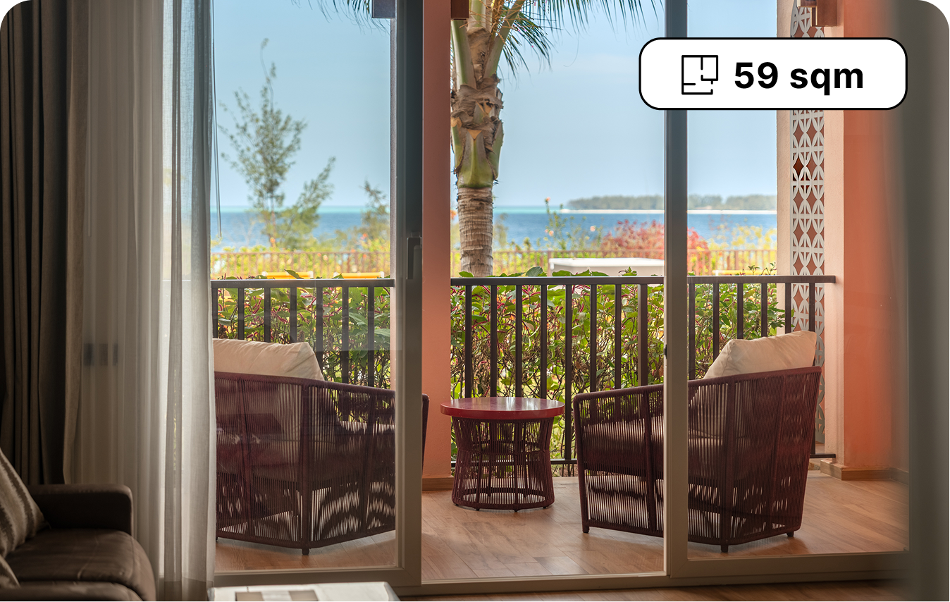 Terrace and ocean view from a Superior Junior Suite at The Mora Zanzibar