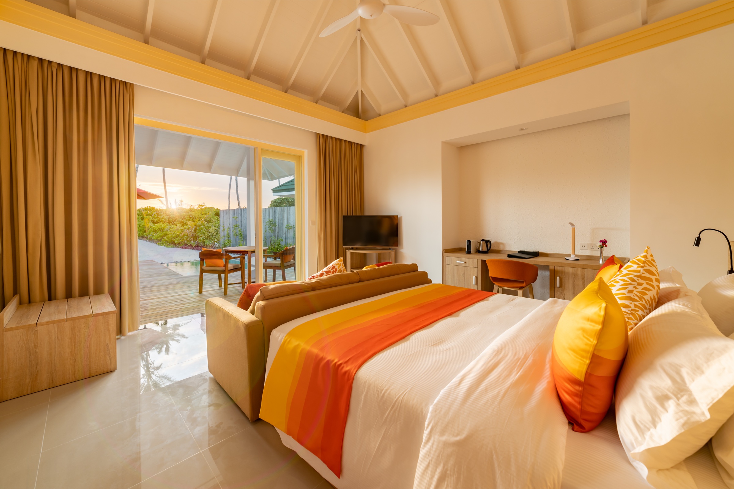 Bedroom in the booked villa category at Siyam World Maldives